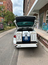 squiq-Traveler Regular im VW Golf 7 Variant mit Campingboxen als modularer Heckauszug für Kombi